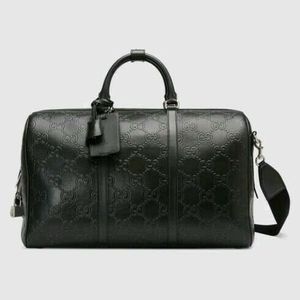 Gucci GG embossed duffle bag
